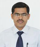 Dr. R. E. Mutha